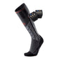 A black and gray knee-high athletic sock with a built-in electronic control module, shown on a white background.