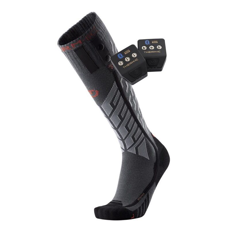 A black and gray knee-high athletic sock with a built-in electronic control module, shown on a white background.