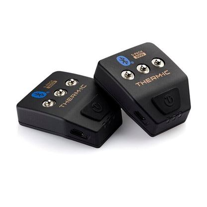 Two black THERMIC Bluetooth batteries with  power buttons, displayed on a clean white background.